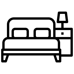 bedroom Line drawing of a bed with two pillows, next to a nightstand that has a lamp on it.